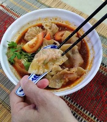 Pork dumplings in Sour & Spicy soup recipe