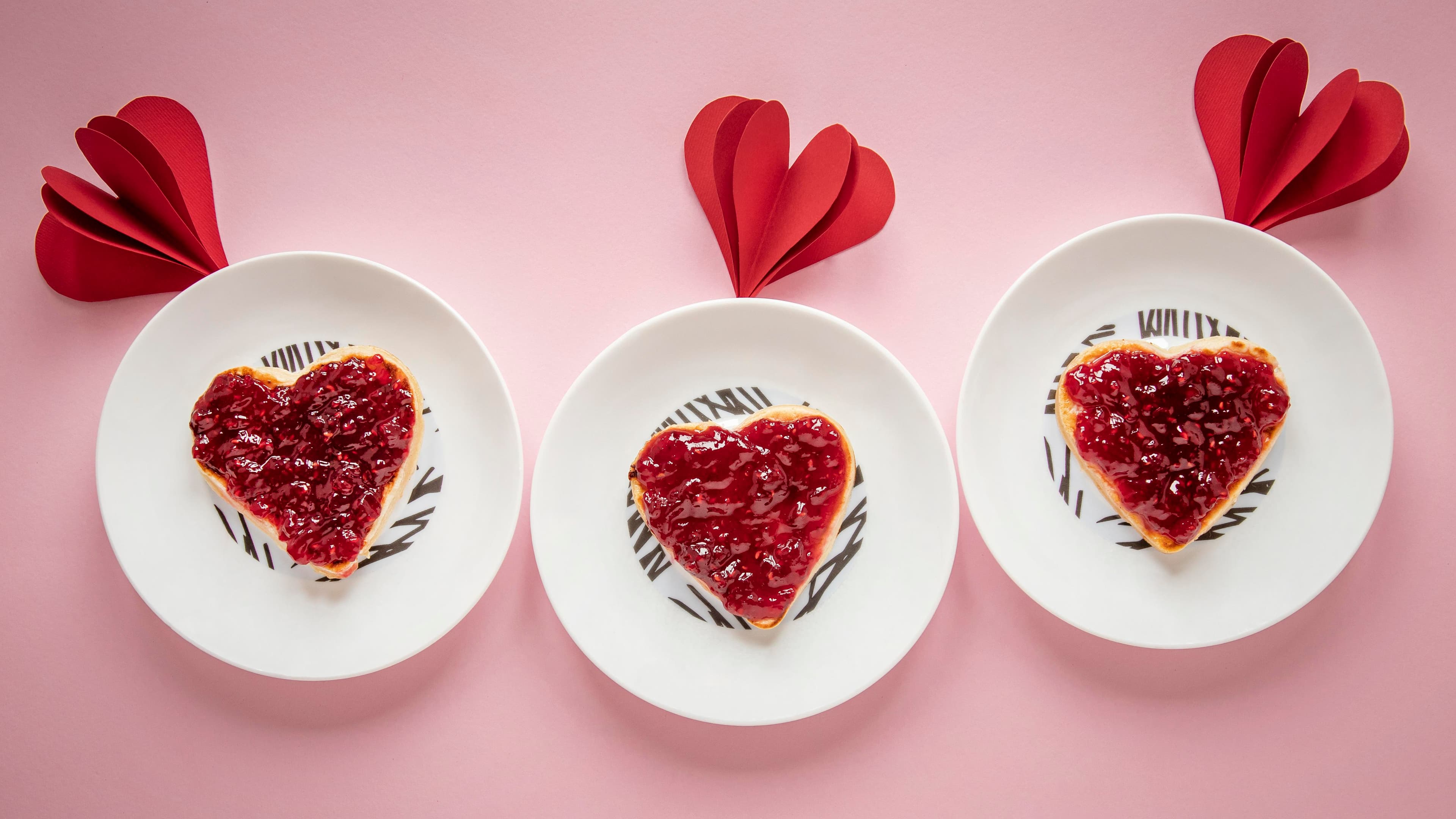 Top view of beautiful valentine's day concept - heart shaped strawberry tart 