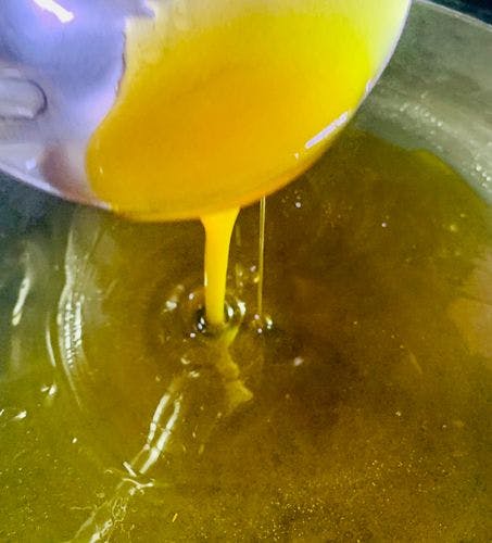 Almond-Brittle-(Badaam-Patti)-Golden-Colored-Melted-Sugar.jpg