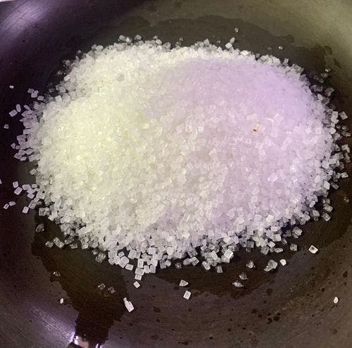 Almond-Brittle-(Badaam-Patti)-Sugar-in-Pan.jpg