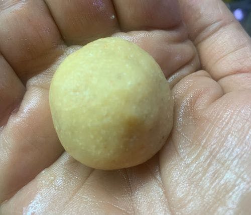 Chilli-Garlic-Potato-Balls-Small-Ball-Of-Potato-Mixture-In-Hand.jpg
