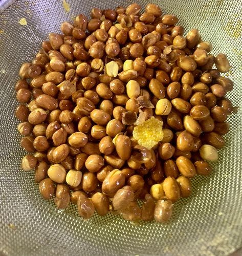 Cornflakes-Mixture-(Namkeen)-Fried-Peanuts-On-Sieve.jpg