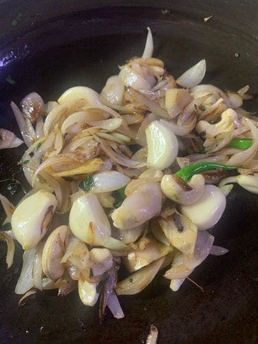 Creamy-Mushroom-Curry-Translucent-Onions-Cashewnut-Garlic-in-Pan.jpg