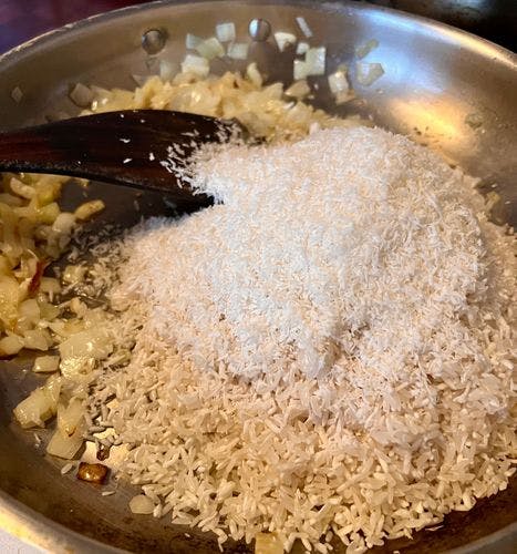 Step 1.1: Add the rice and coconut shreds
