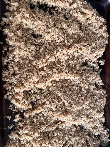 Step 1.1: Take off the heat, uncover, and place the quinoa on a baking sheet or another wide, flat surface where it can cool for 20 minutes or so