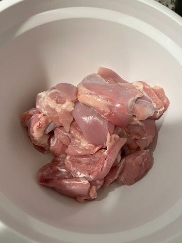 Step 1.1: Wash the chicken thighs thoroughly and pat dry them with a paper towel