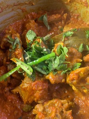 Lahori-Karahi-Mutton-Mint-Leaves-And-Green-Chilli-added-With-Mutton.jpg