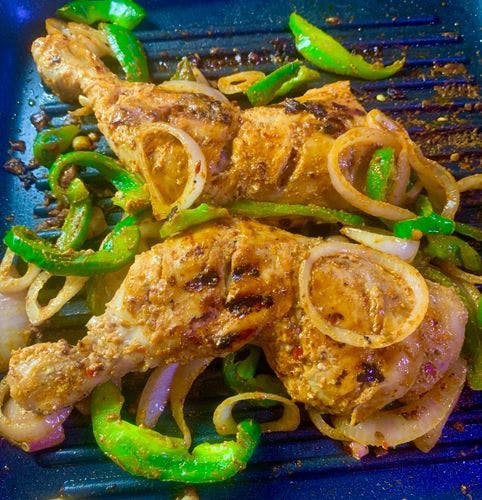 Peri-Grilled-Chicken-Grilled-Chicken-Whole-Legs-And-Sauteed-Onion-Rings-And-Capsicum.jpg