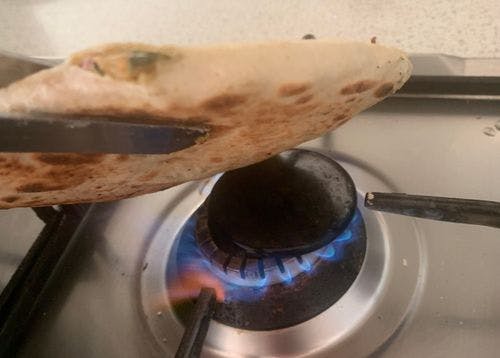 Stuffed-Spinach-Potato-Naan-Stuffed-Naan-On Direct-Flame-With Thong.jpg