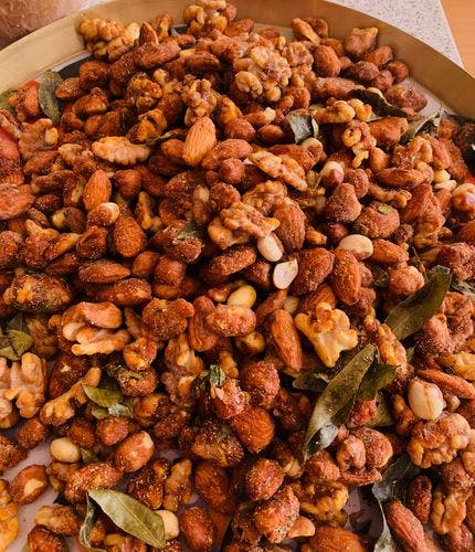 Spiced nuts in a plate