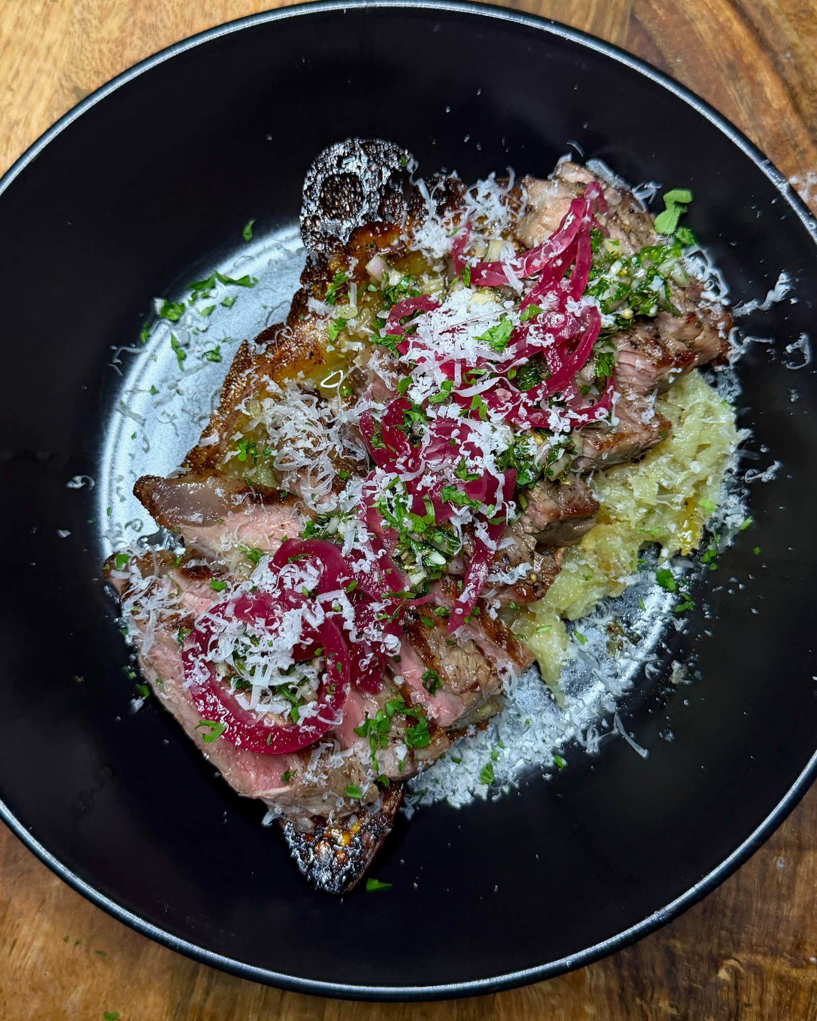 Caramelised Loaded Sweet Potato with Steak, Chimichurri & Pickled Onions recipe