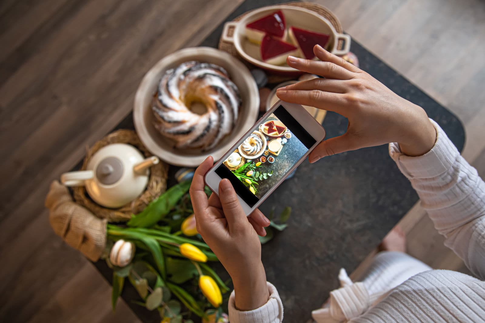 food creator capturing food content for consistent posting at home.