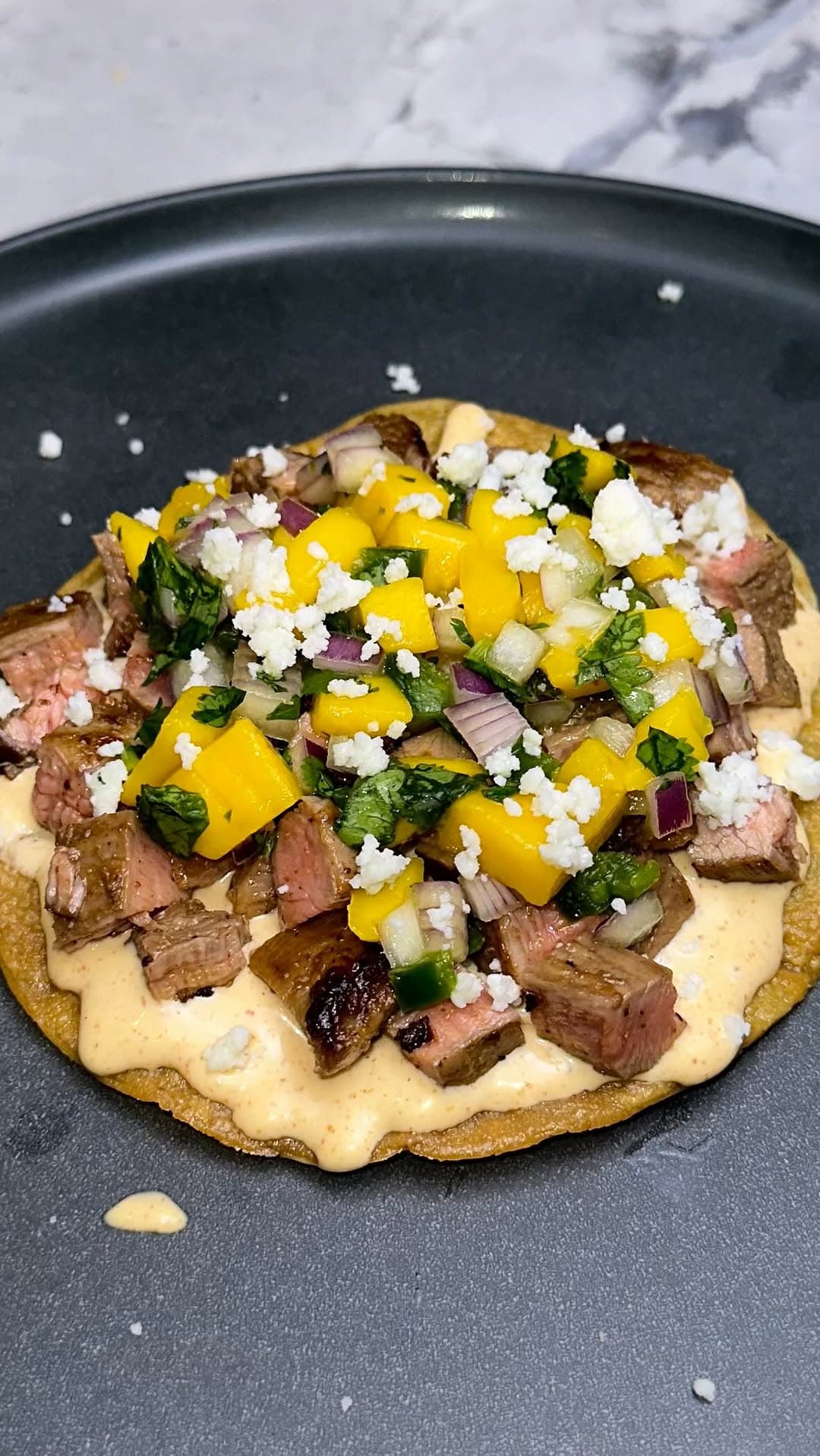 Crispy Ibérico Flank Steak Tostada recipe