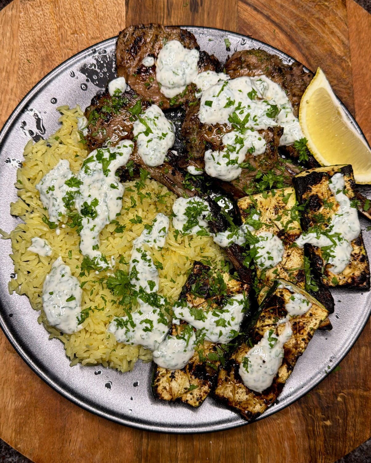 Greek-Style Lamb Cutlets with Char-Grilled Zucchini, Herby Rice & Garlic Yoghurt Sauce recipe