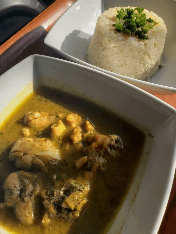 A close-up of a plate containing Nigerian Turkey Pepper Soup.