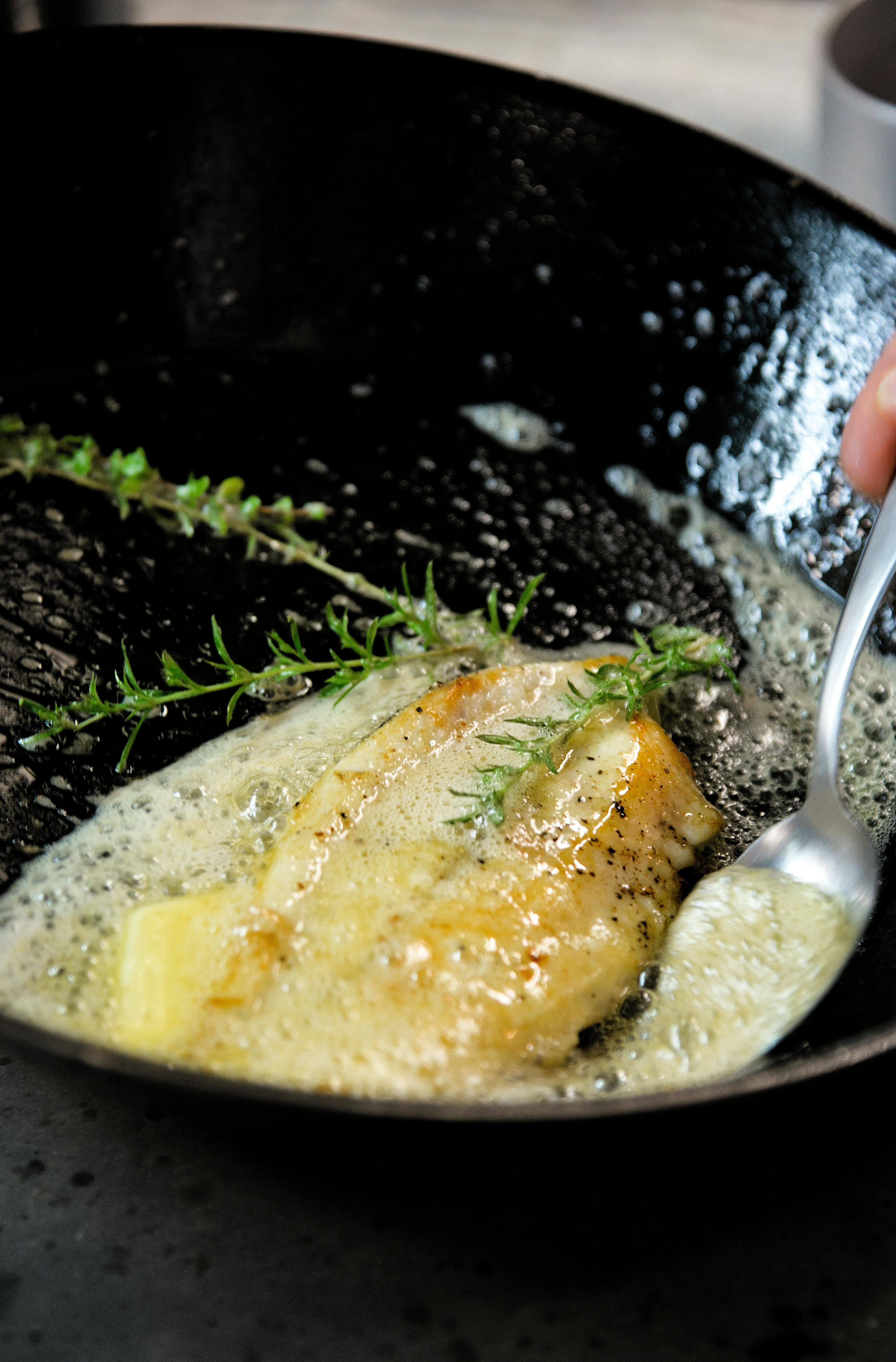 Melted compound butter in a hot pan