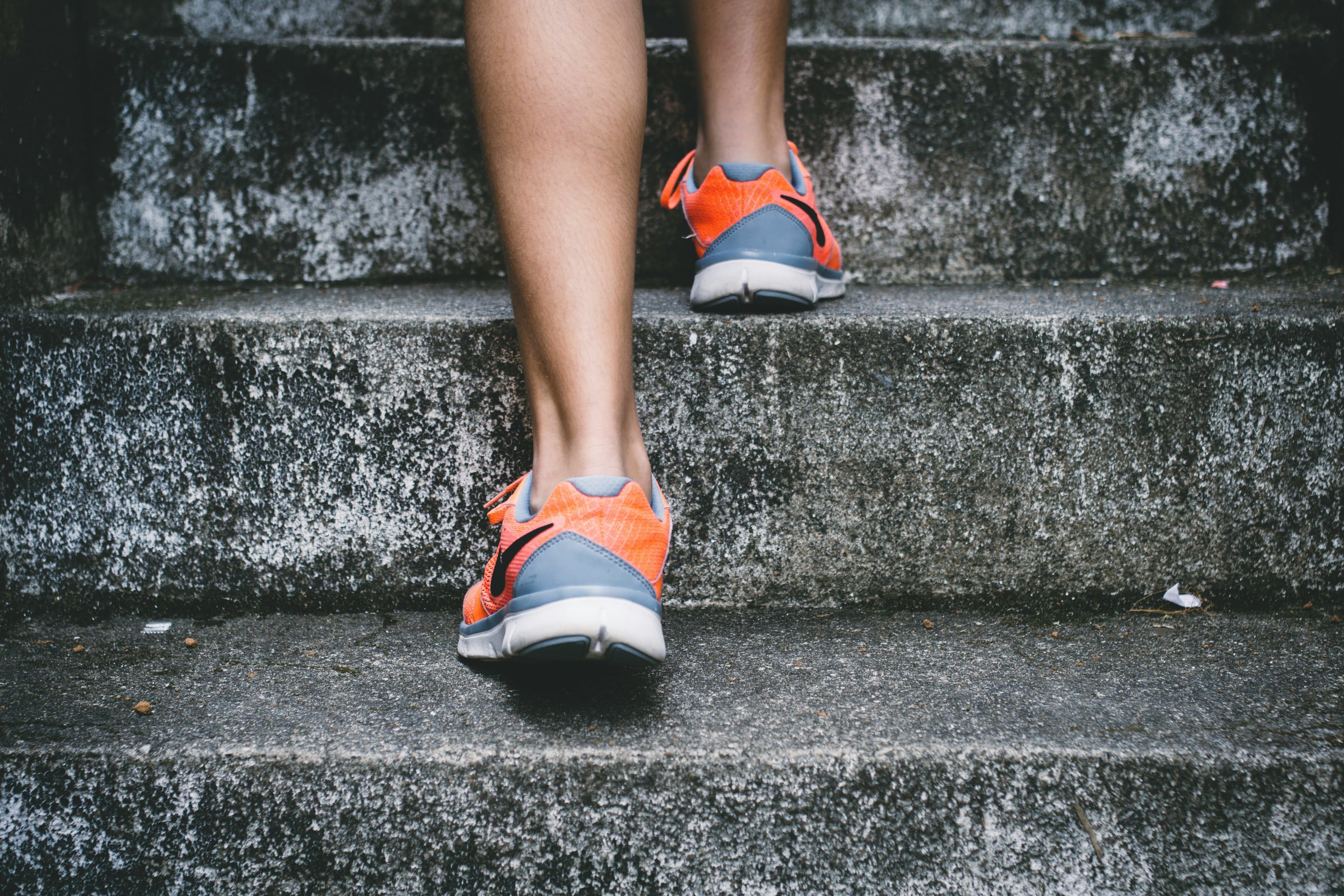 A person with healthy bones climbing upstairs.
