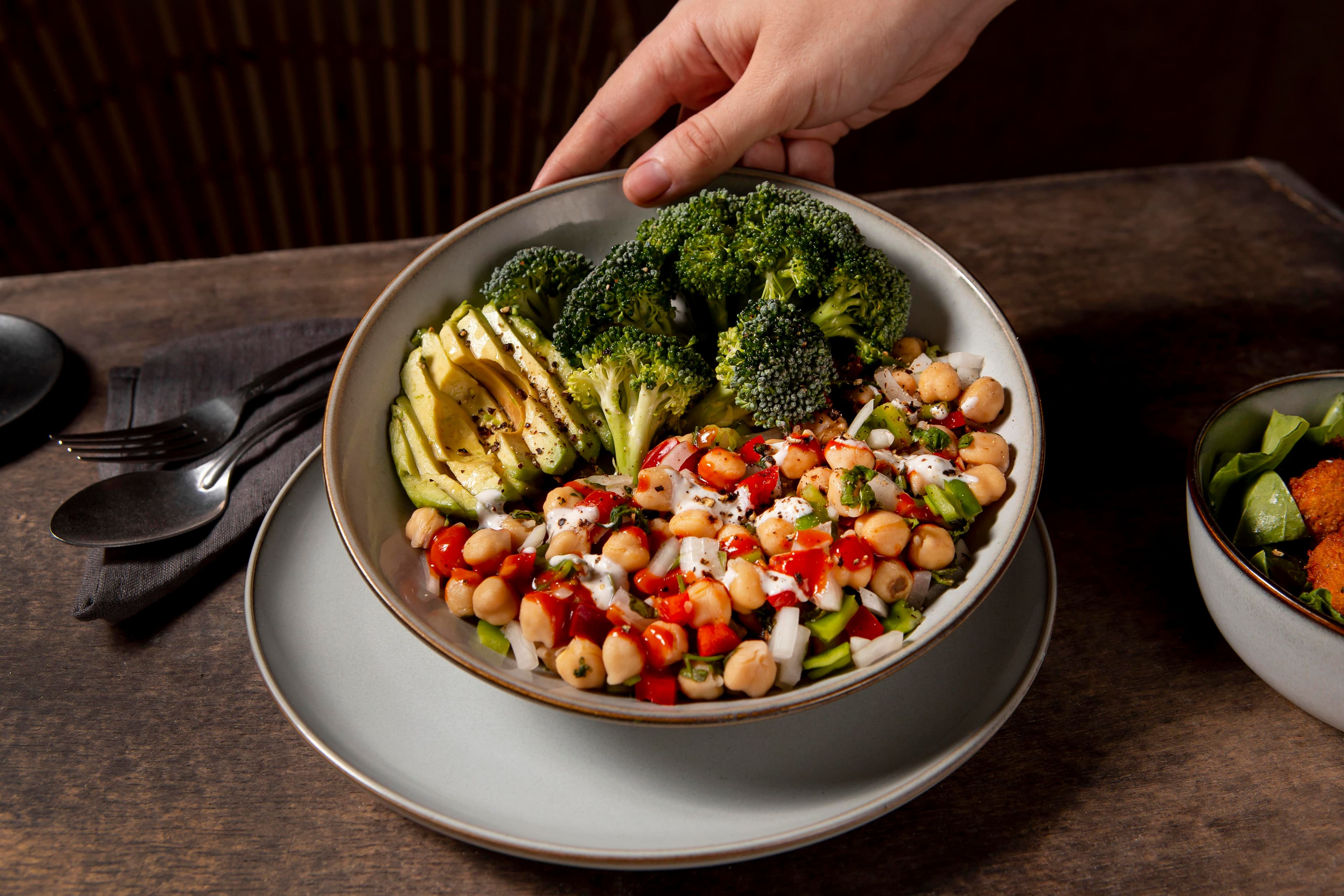 Assortment of high-protein foods like eggs, beans, and meat