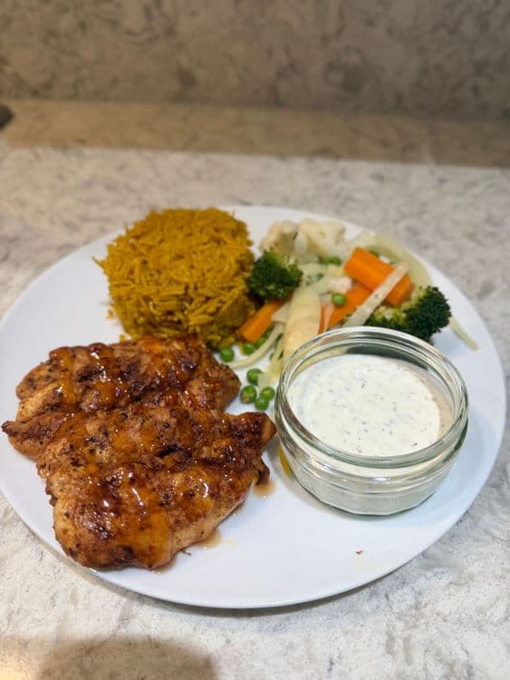 Chicken Strips with Spiced Rice and Garlic Yoghurt recipe