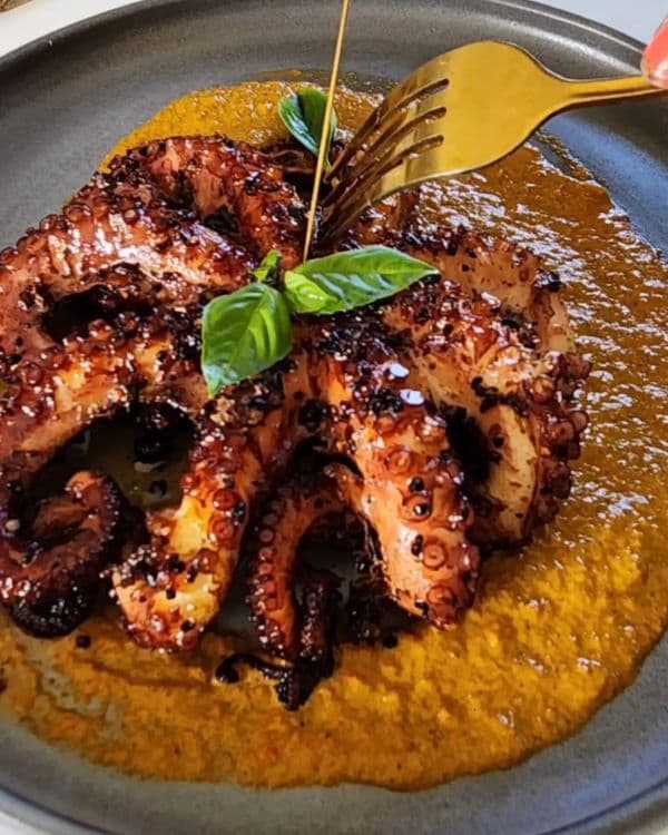 Charred Octopus with Chili Lime Romesco Sauce recipe