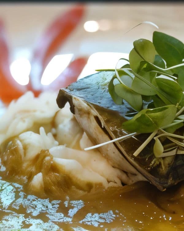 Baked Sea Bass with Hoja Santa and Tomatillo Sauce recipe