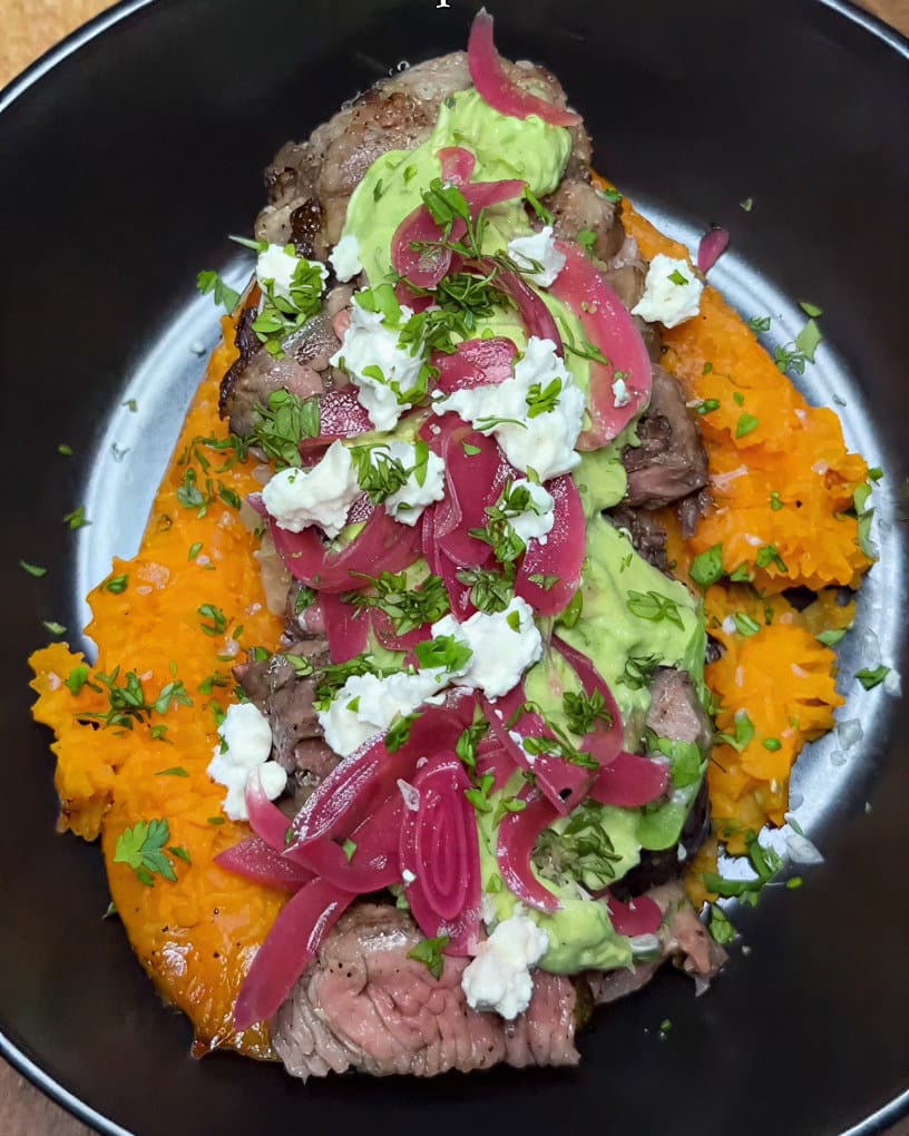 Caramelised Sweet Potato with Avocado Crema, Steak & Pickled Onions recipe