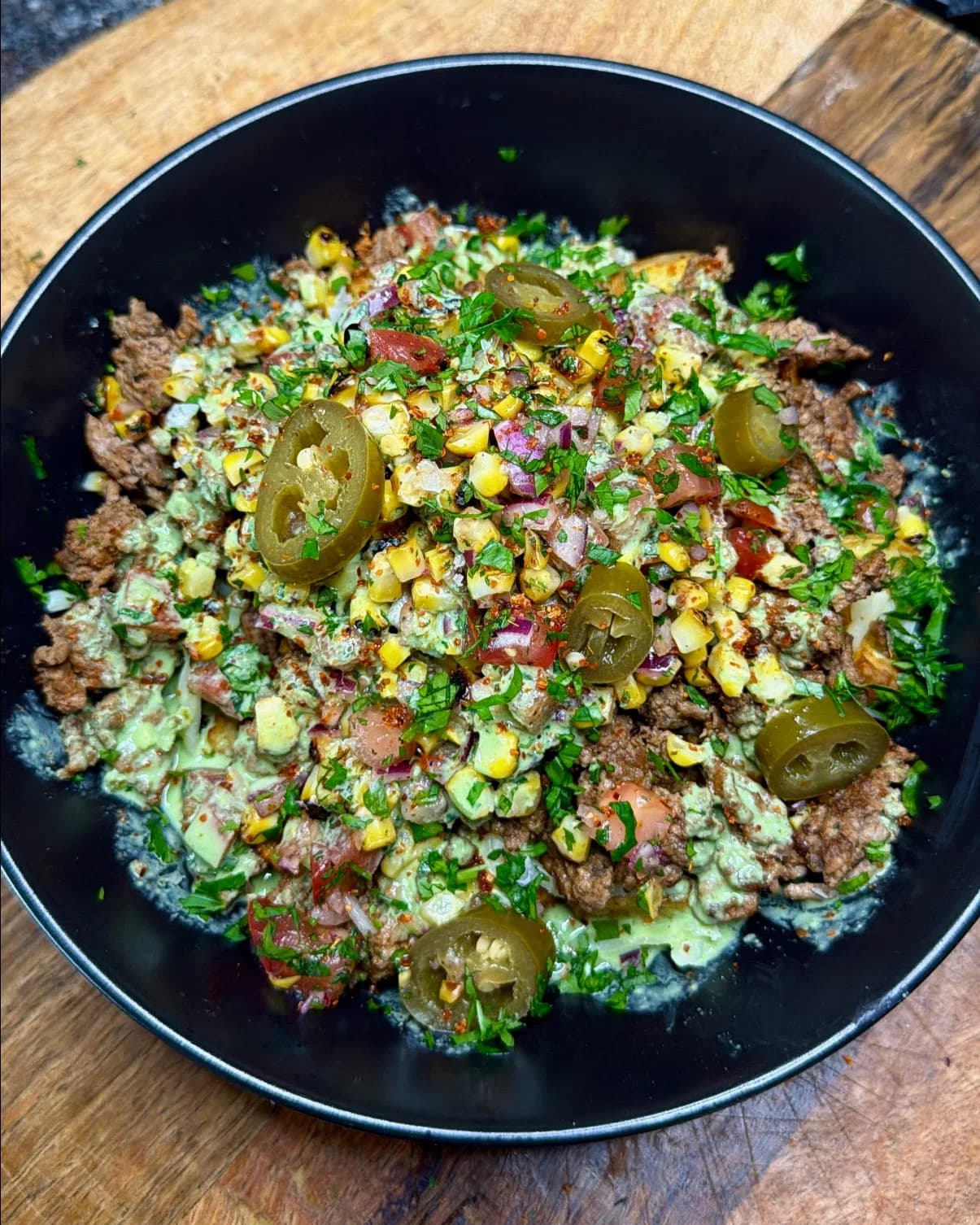 Cheesy Beef Loaded Potatoes with Charred Corn Salsa & Jalapeño-Lime Yoghurt Sauce recipe