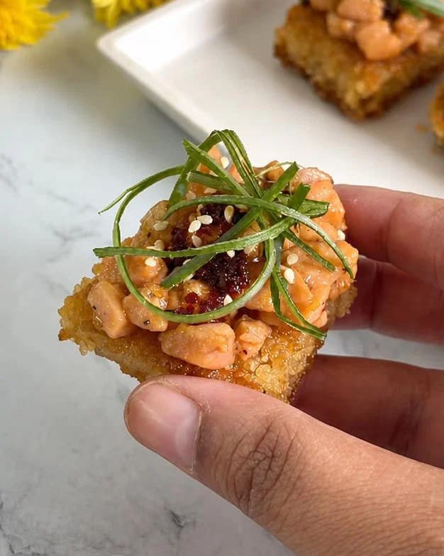 Peanut Butter Honey Glazed Salmon Bites with Crispy Rice & Chilli Oil recipe