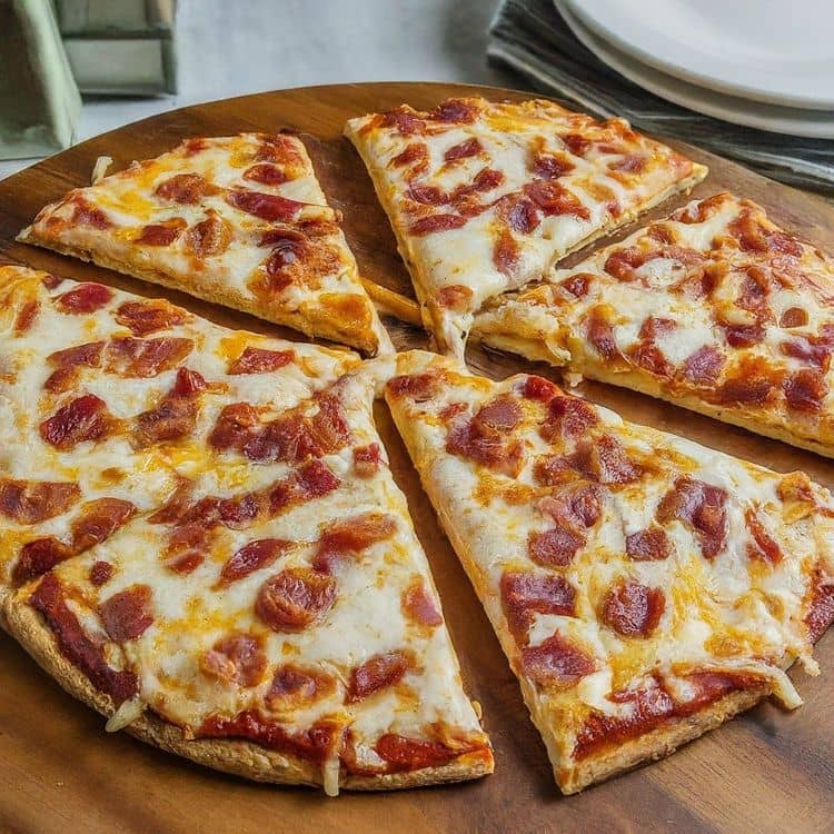 step-by-step recipe for making a delicious keto bacon cheese pizza: recipe