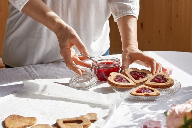 Woman placing easy desserts in a plate